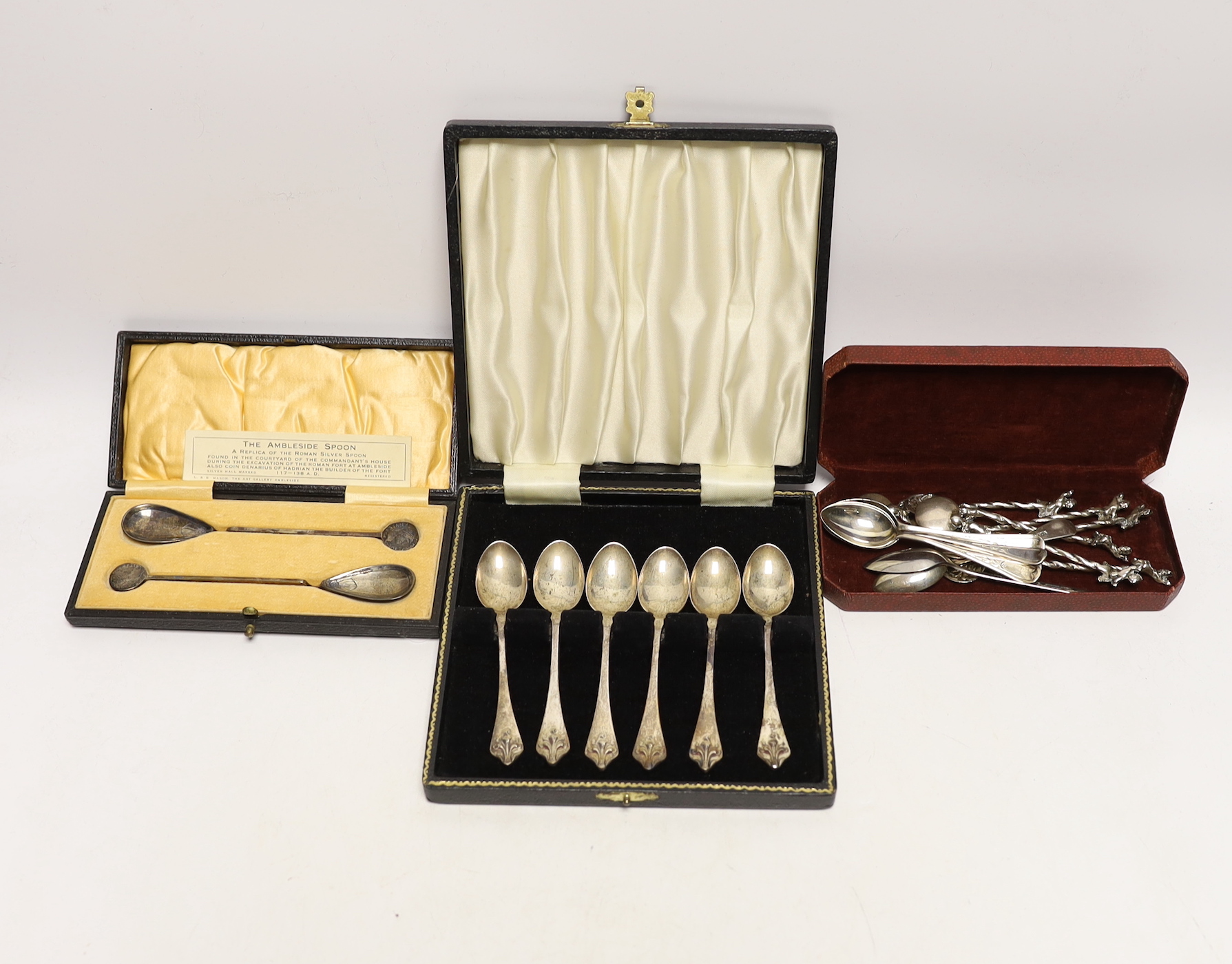 A cased set of six silver coffee spoons, a cased pair of 1920's preserve spoons and other sundry flatware.